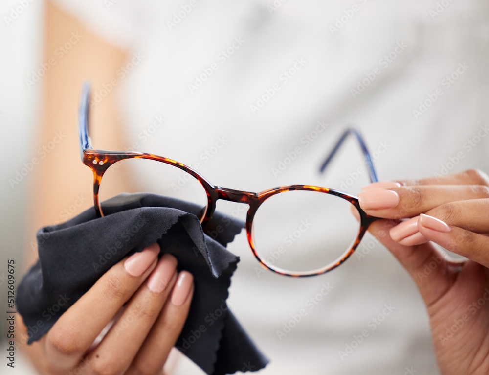 Making sure my vision remains intact. Cropped shot of an unrecognizable woman standing alone and usi