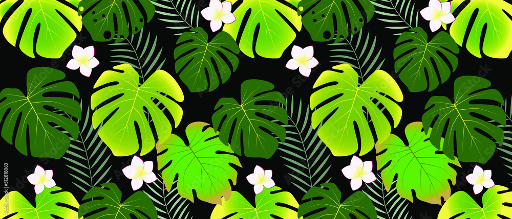 Different tropical leaves on dark background