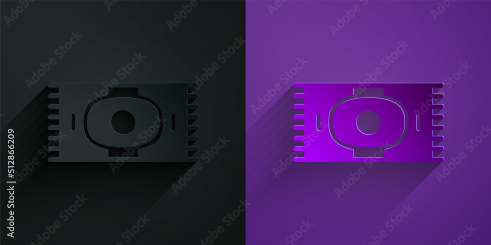 Paper cut Classic carpet icon isolated on black on purple background. Paper art style. Vector