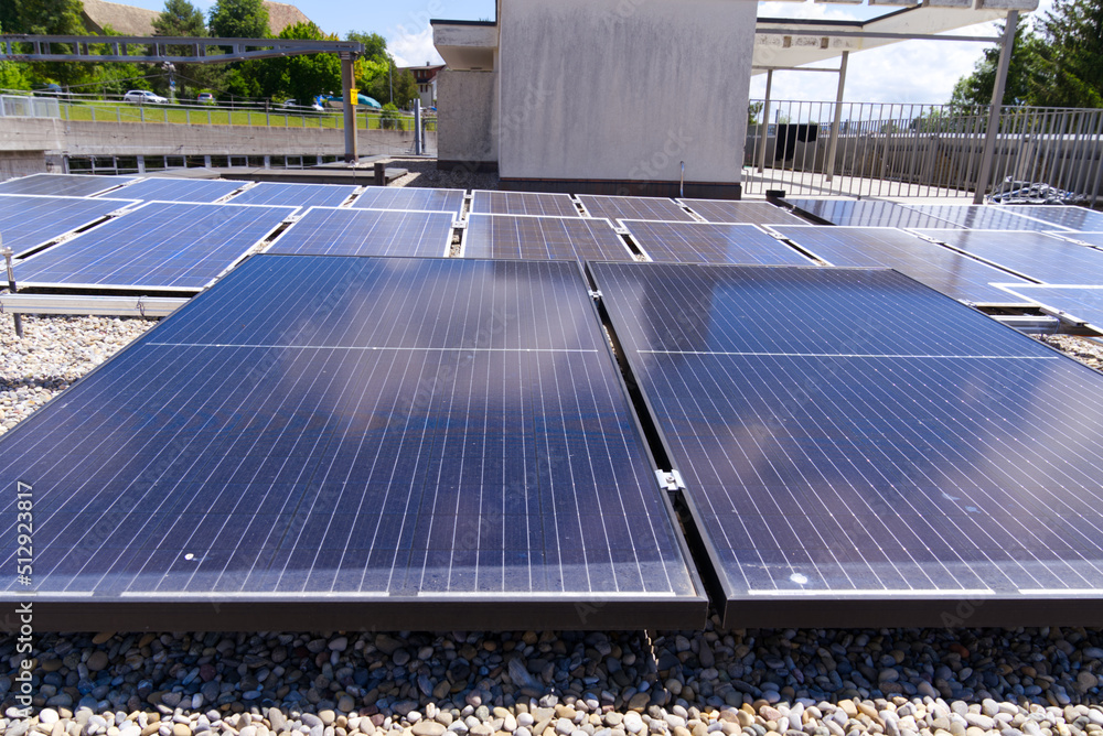 Solar panels on rooftop at village Forch, Canton Zürich, on a sunny summer day. Photo taken June 10t