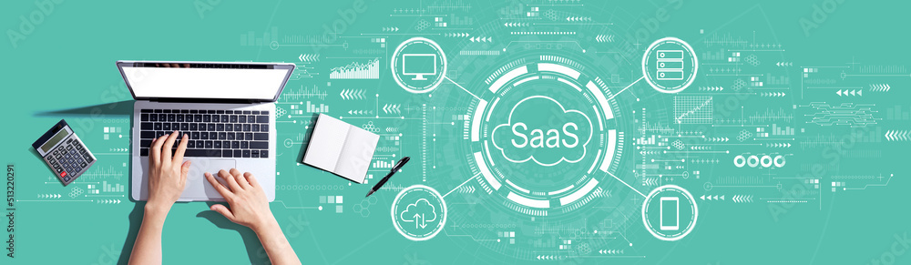 SaaS - software as a service concept with person using a laptop computer