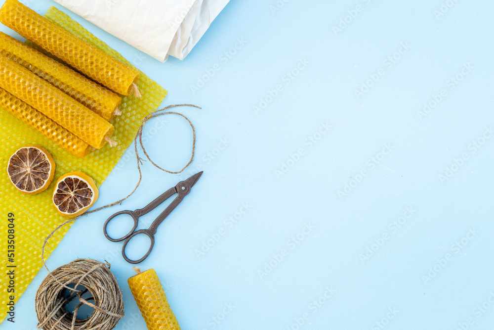 Process of making honey aroma beeswax candles with honeycombs, top view