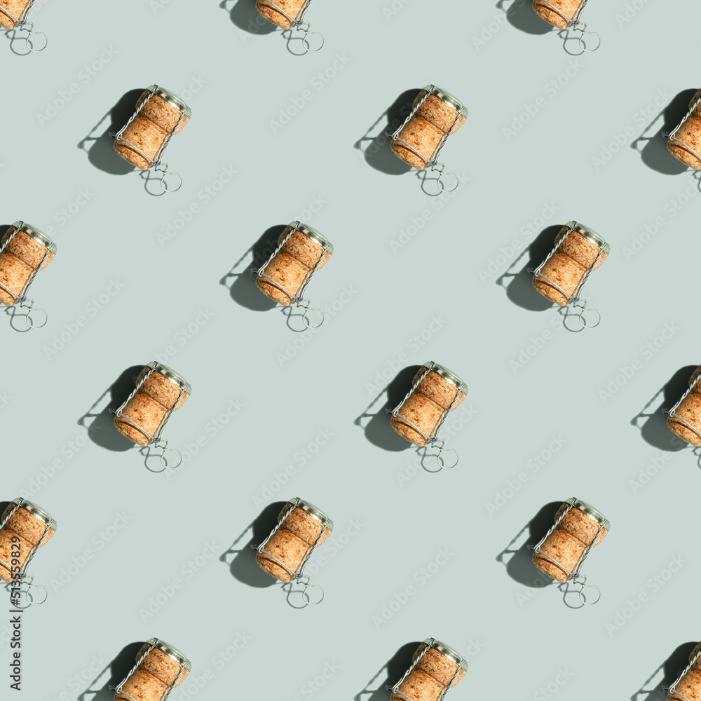 Pattern with champagne cork on blue background with shadow