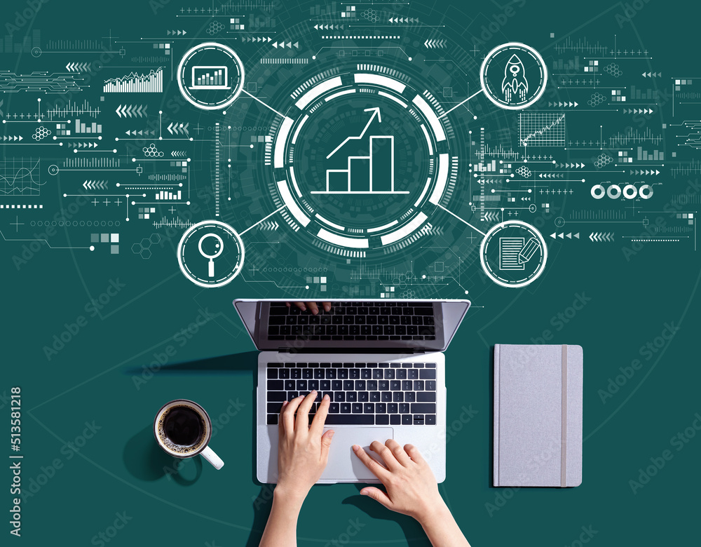 Business growth analysis with person using a laptop computer