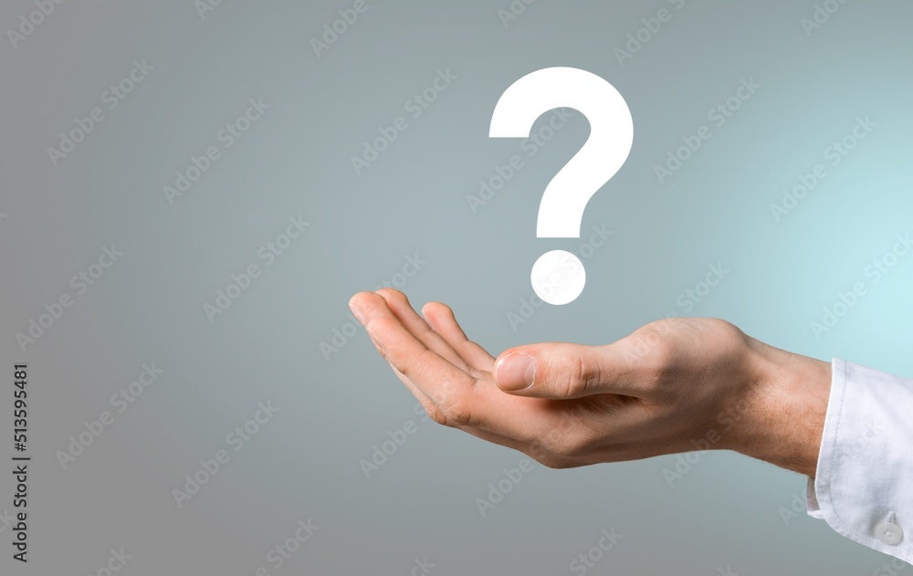 businessman hand holding question mark. concept of Question mark and FAQs, Ask quiestion online