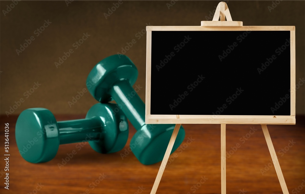 benefits of strength training infographics easel sign with notebook and heavy dumbbell