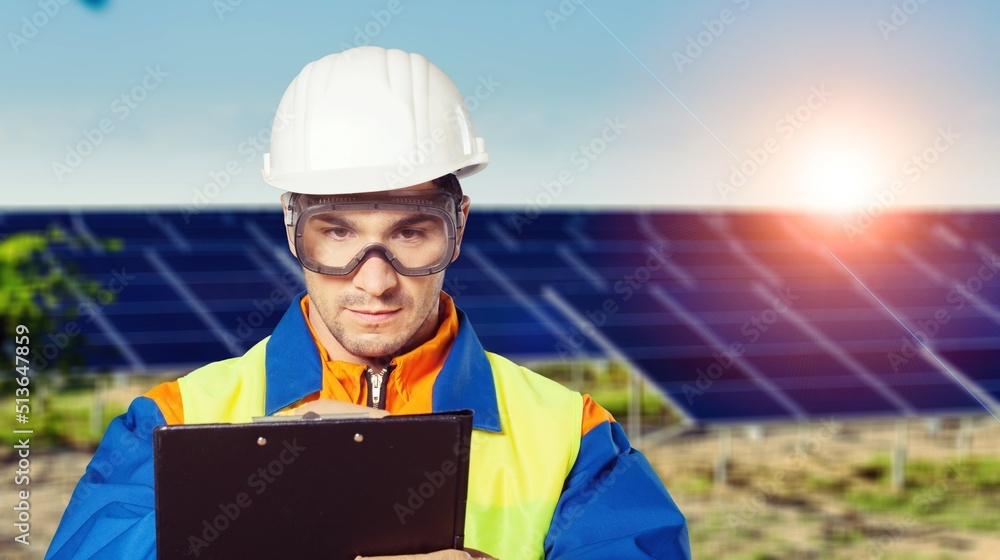 Specialist technician professional engineer checking installing solar roof panel on the factory