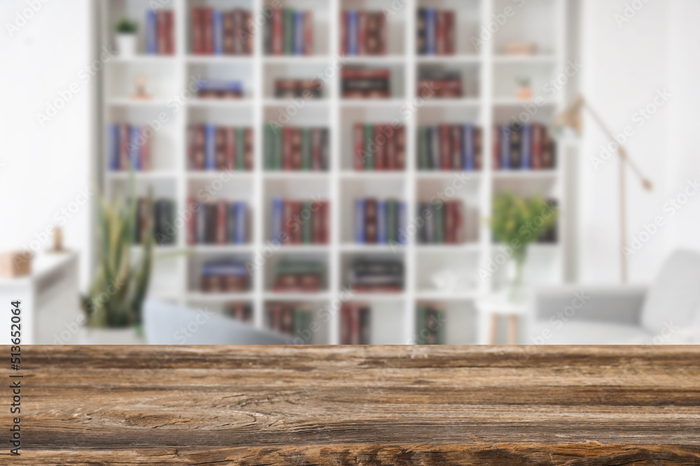 Empty wooden table in home library