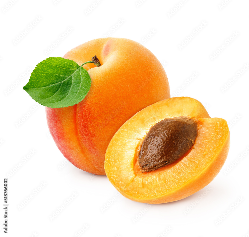 Apricot fruit with half of apricot and apricot kernel isolated on white background.