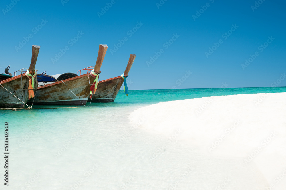 Shot of a boat docked on the shore on a beach in Phuket Thailand