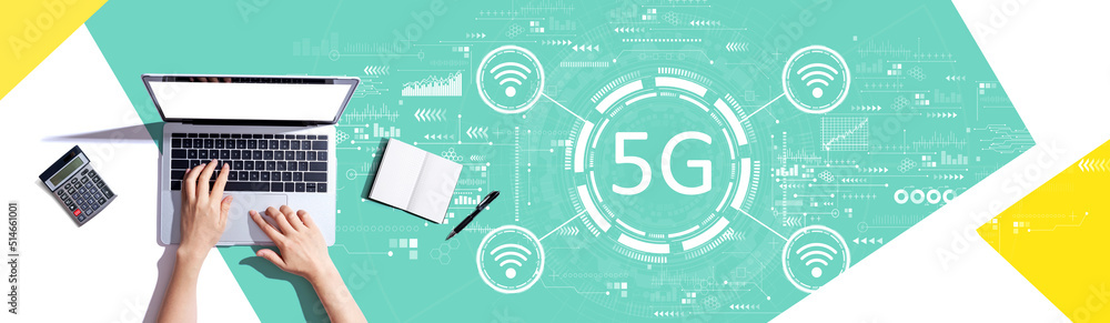 5G network with person using a laptop computer