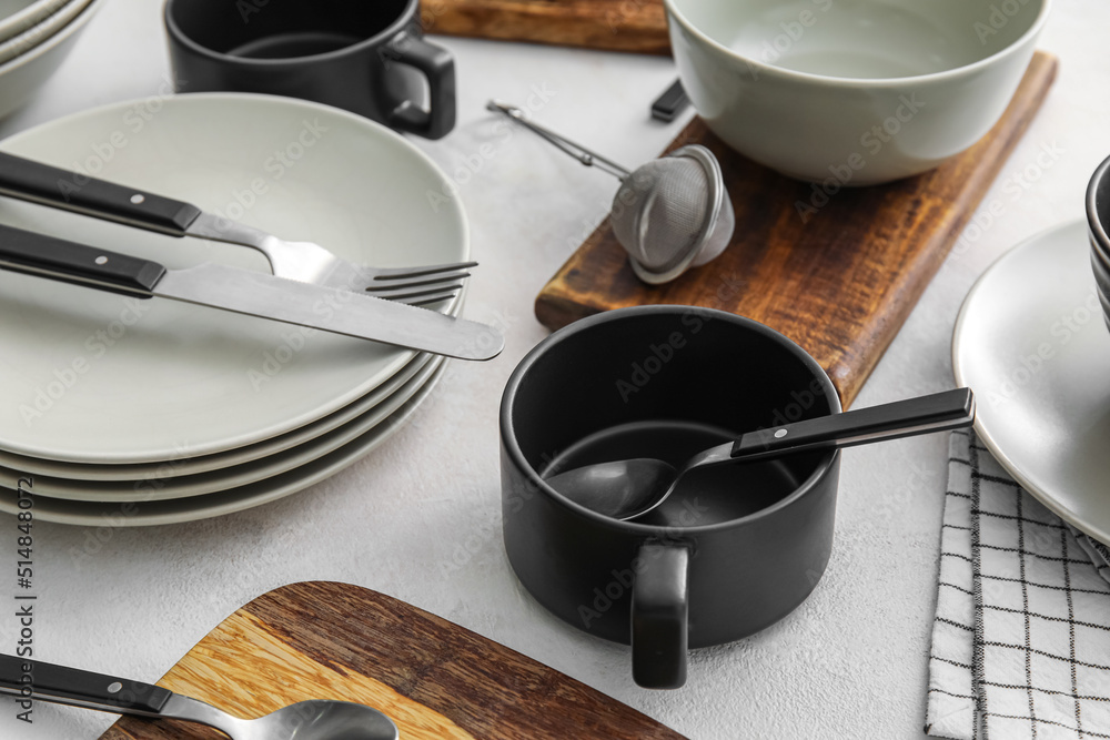 Clean dinnerware on light table, closeup