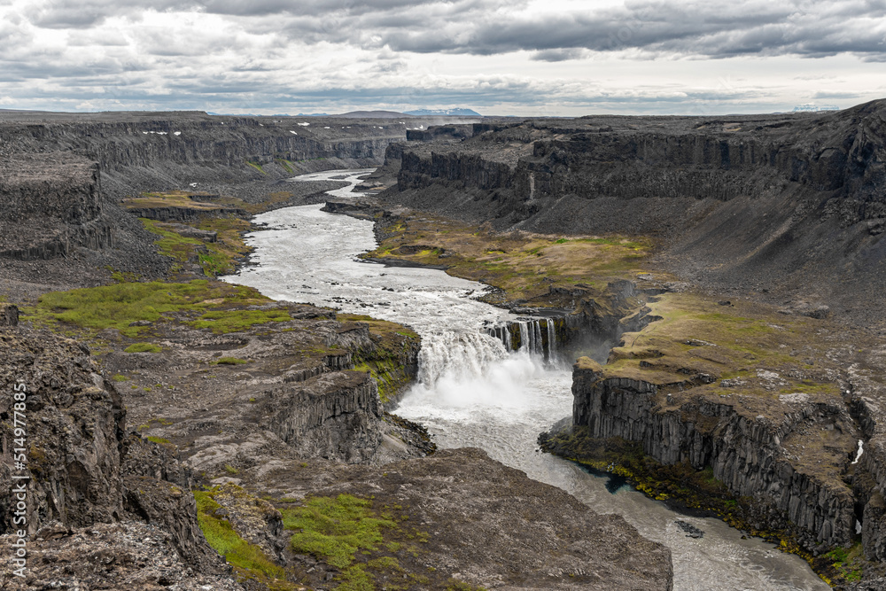 Aerial view of the waterfall Hafragilsfoss and the surrounding canyon Jokulsargljufur seen from the 