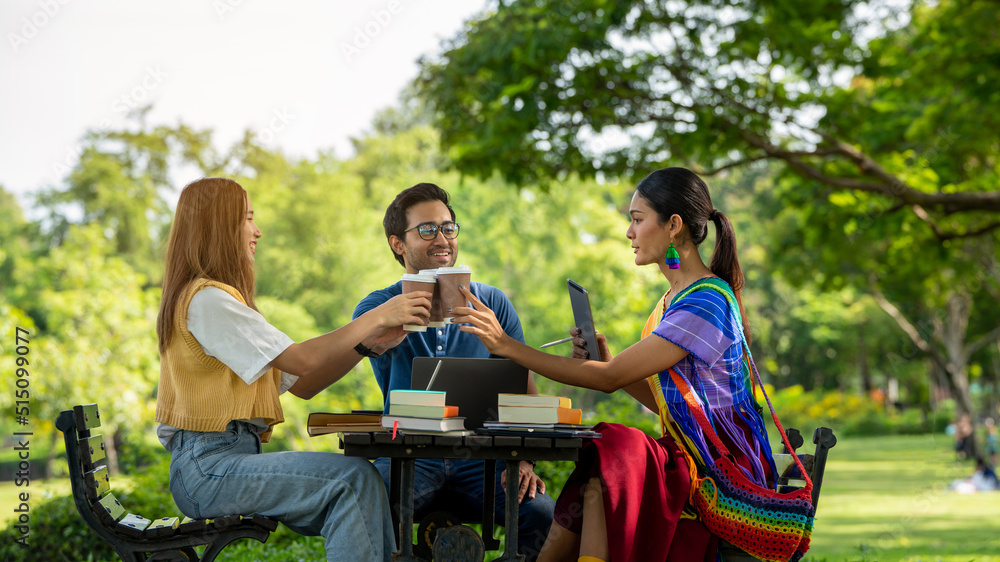 trust partnership.Young happy friend partner people Trust hand holding a cup of coffee and bump fist