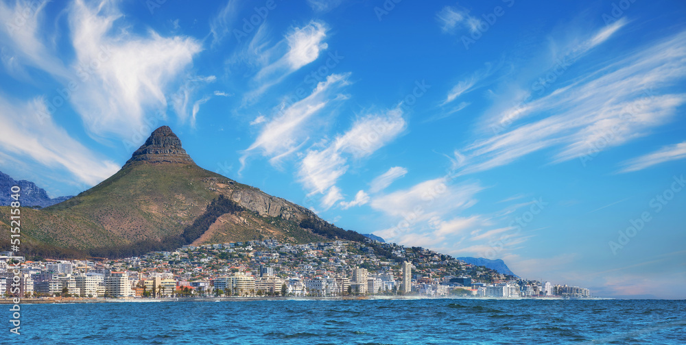 Copy space, panorama seascape with clouds, blue sky, hotels, and apartment buildings in Sea Point, C