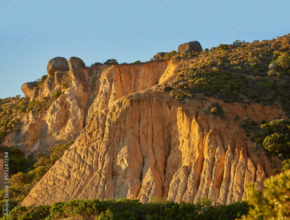 Low angle view of a mountain peak in South Africa. Scenic landscape of a remote hiking location on L