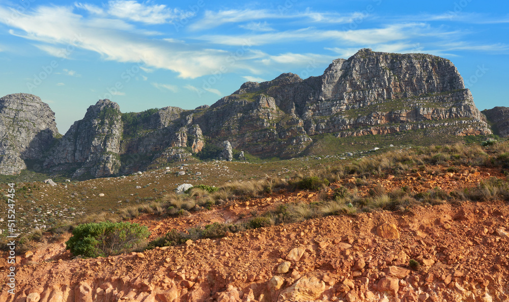 Low angle view of a mountain peak in South Africa. Scenic landscape of a remote hiking location on L