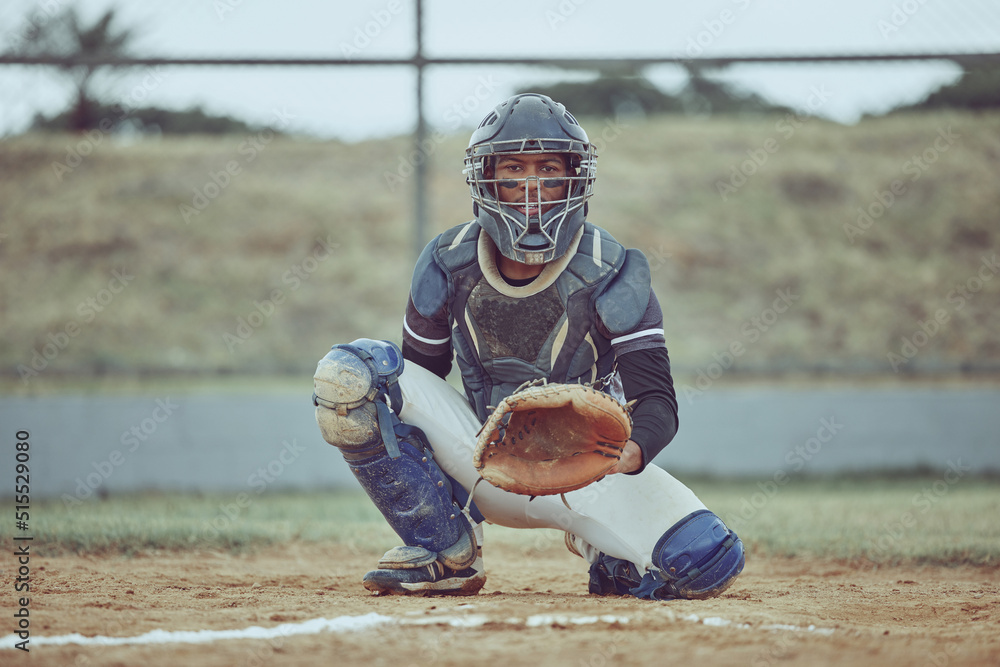 Portrait african american pitcher ready to make a catch with a mitt on a baseball field. Young sport