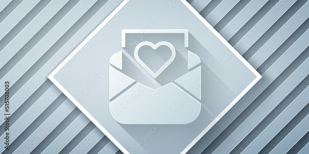 Paper cut Envelope with Valentine heart icon isolated on grey background. Message love. Letter love 