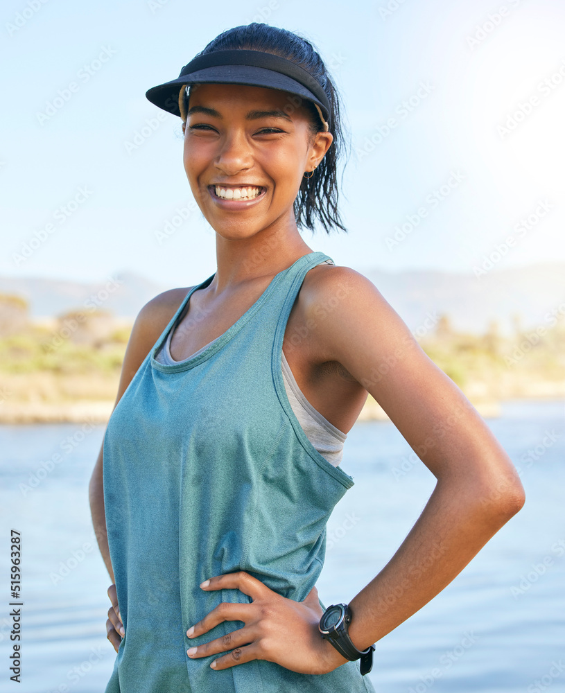 Fit young woman enjoying her time off on a holiday, vacation or weekend getaway outside on a lake or