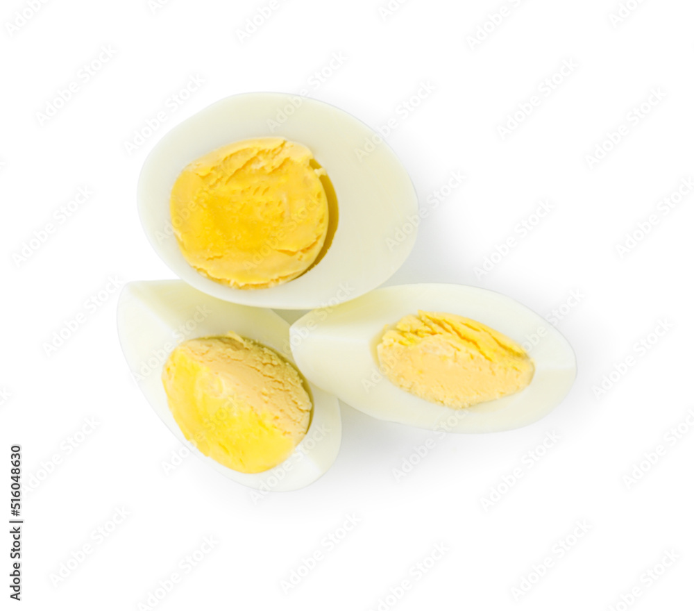 Pieces of boiled chicken egg on white background