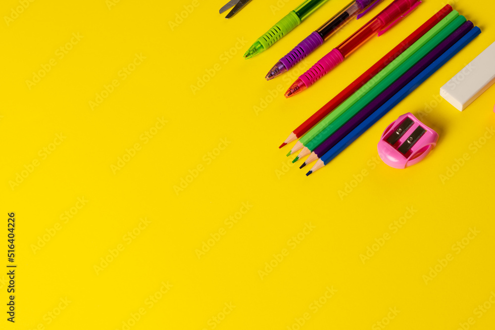 Image of school drawing tools on yellow surface with copy space