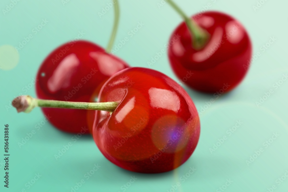 Tasty sweet fresh Cherries with leaves on the desk