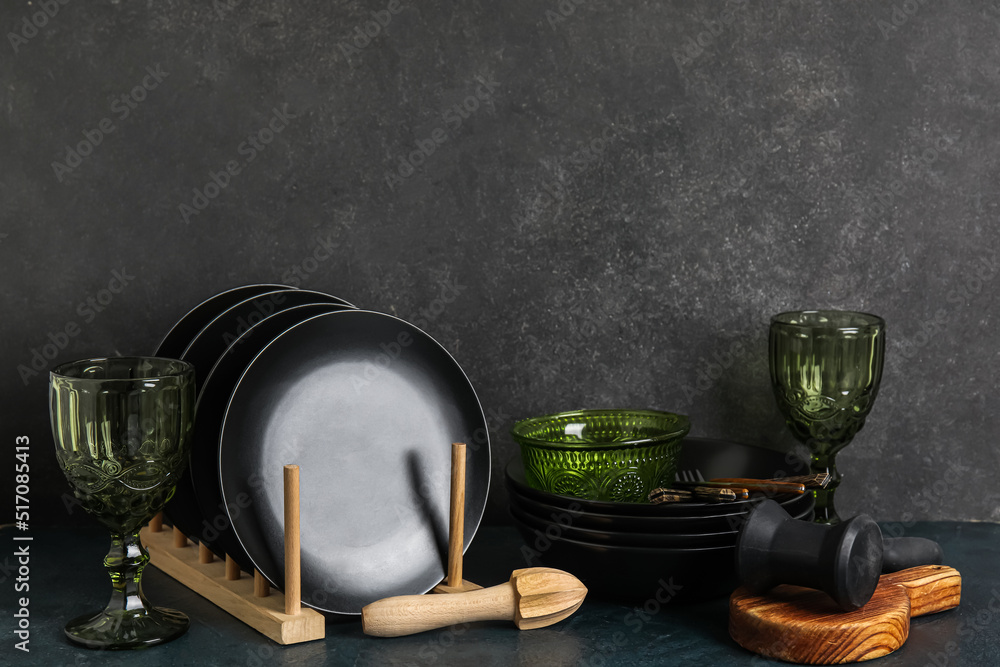 Clean tableware on dark background