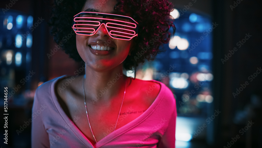 Close Up Portrait of Diverse Multiethnic Young Latin Female Dancing in Futuristic Neon Glowing Glass