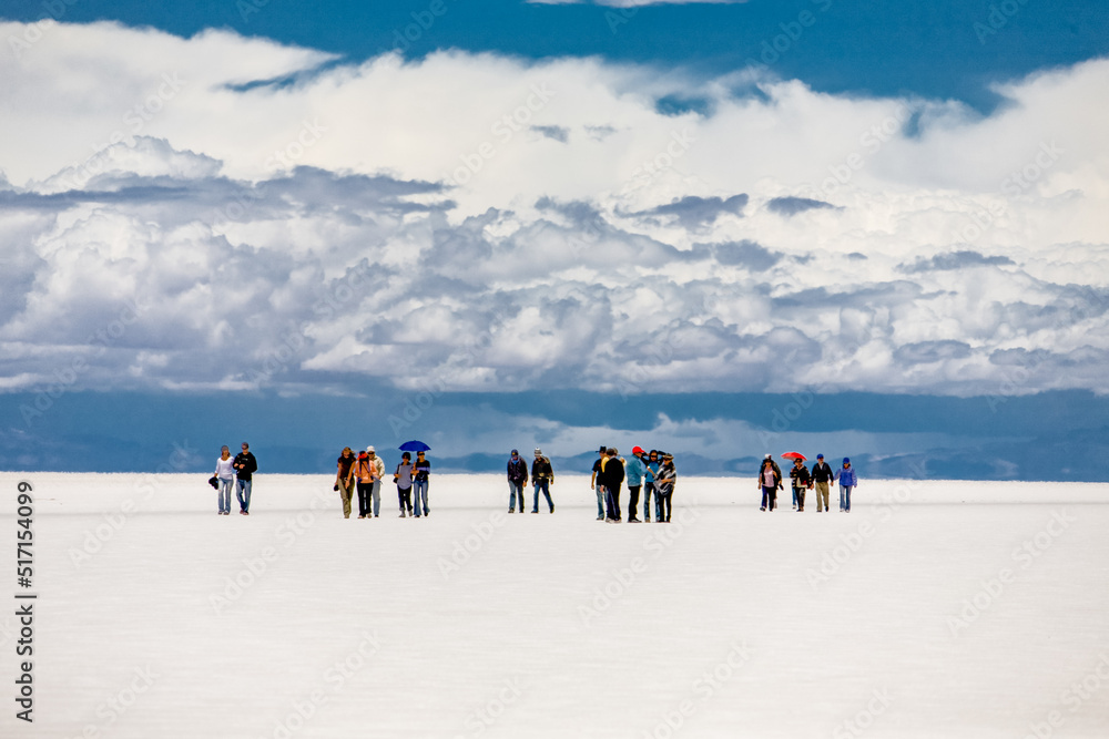 Tourists on worlds largest salt flat Salar de Uyuni, Bolivia. South America nature