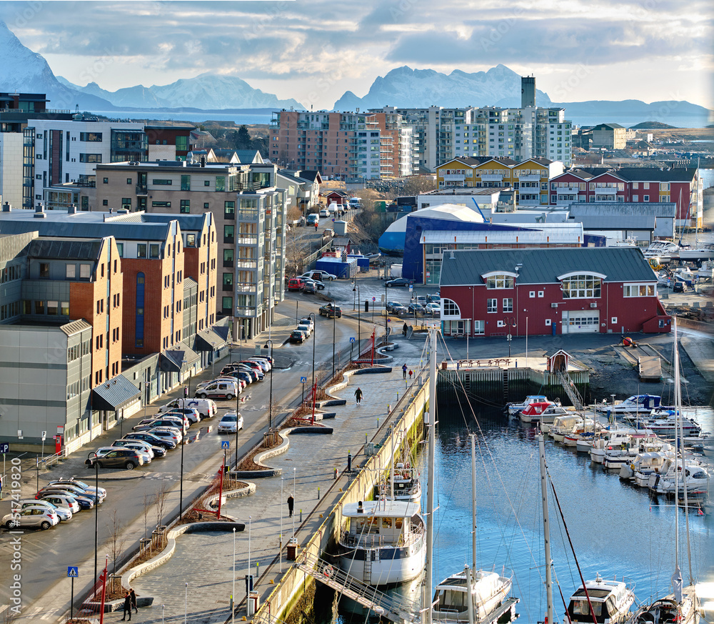 The busy city of Bodo and its surroundings by the harbor and seaside. Landscape view of a dockyard d