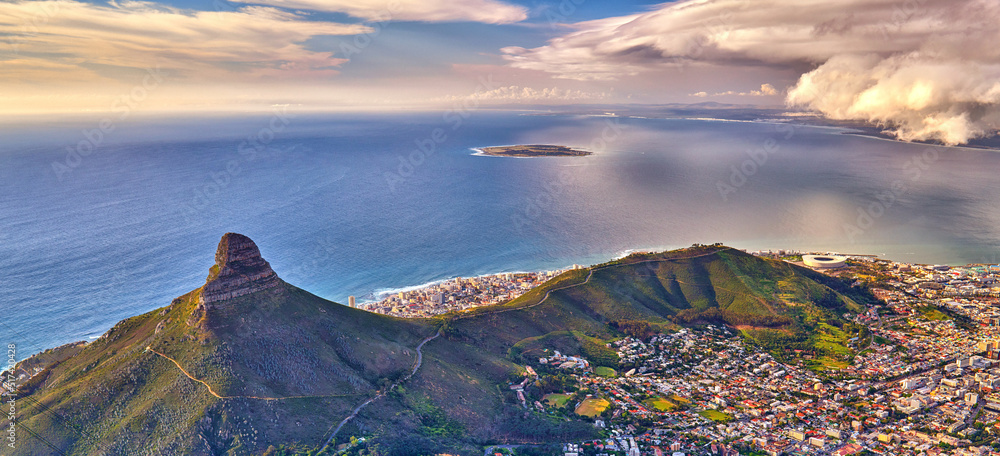 Aerial view of Lions Head mountain with the ocean and cloudy sky copy space. Beautiful landscape of 