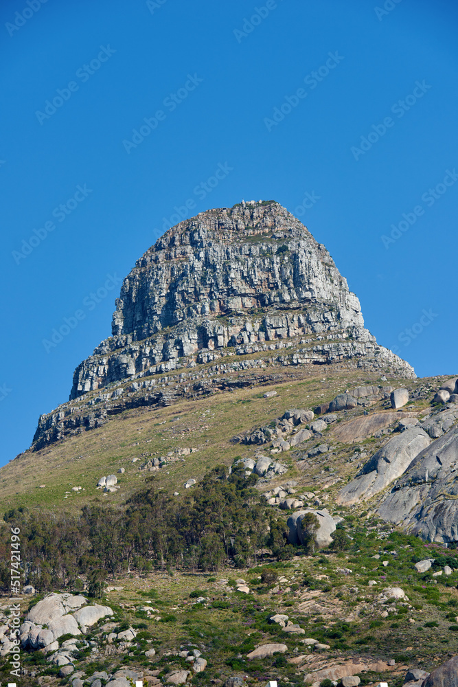 Lions Head mountain with a blue sky and copy space. Beautiful below view of Rocky Mountain peak cove