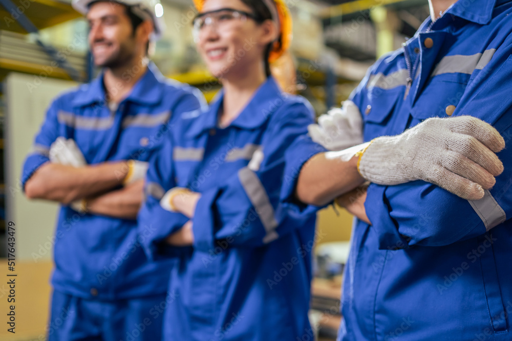 Portrait Group of male and female industrial worker working in factory.