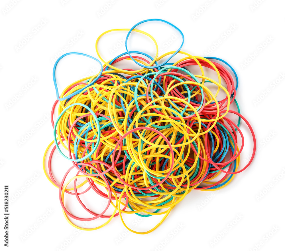 Heap of elastic rubber bands on white background