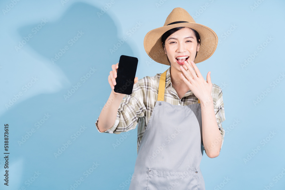 Portrait of young Asian female farmer