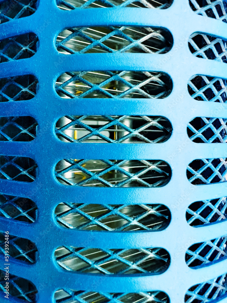 Metal abstract grid background texture close-up of machinery