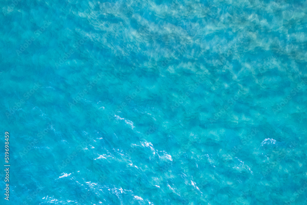 Sea surface aerial view water surface texture, Turquoise sea background Beautiful nature Amazing vie