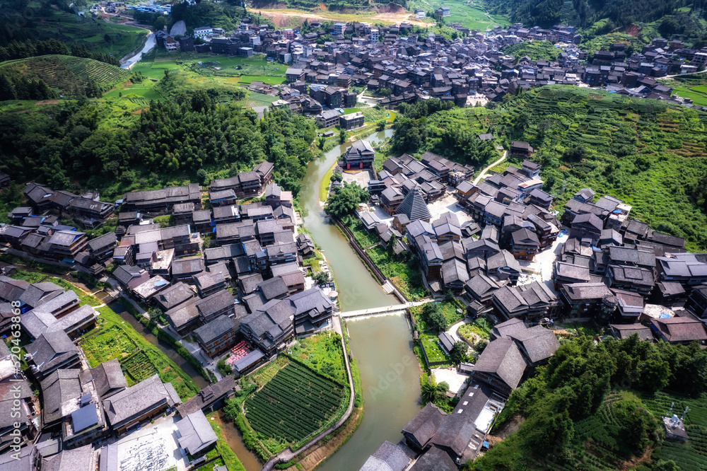 Aerial photography of the pastoral scenery of ancient Dong peoples houses in Bazhai, Chengyang, Liu