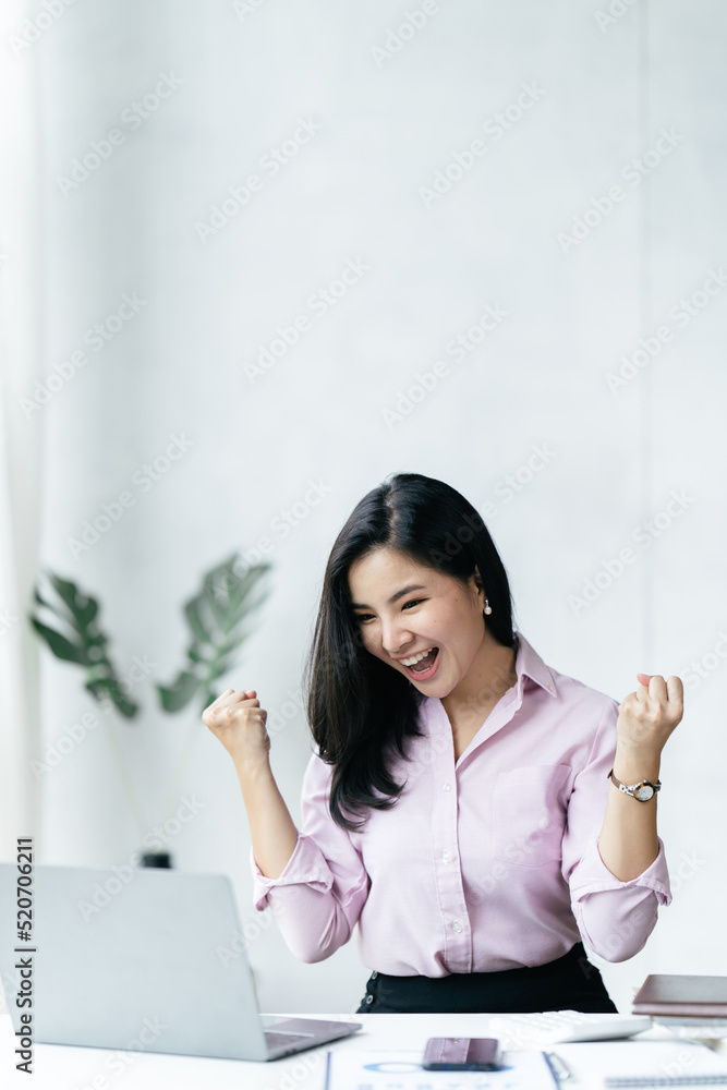 Excited happy business woman looking at computer laptop screen, Cheerful young Asian woman using com