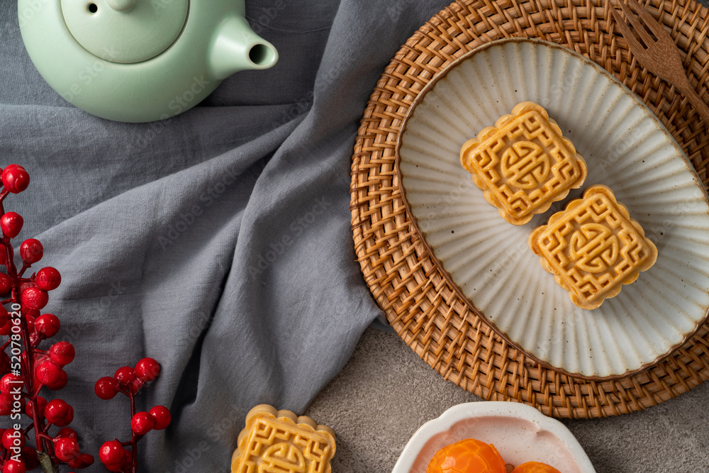 Delicious mung bean moon cake for Mid-Autumn Festival food mooncake on gray table background.