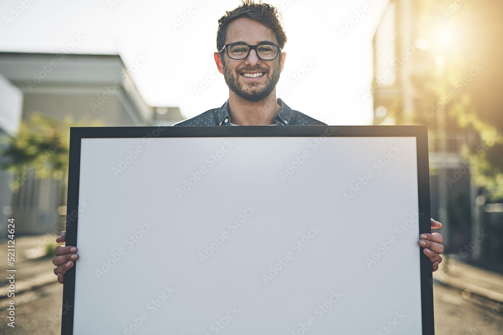 Copyspace, marketing and advertising with a young business man holding a blank sign or poster. Portr