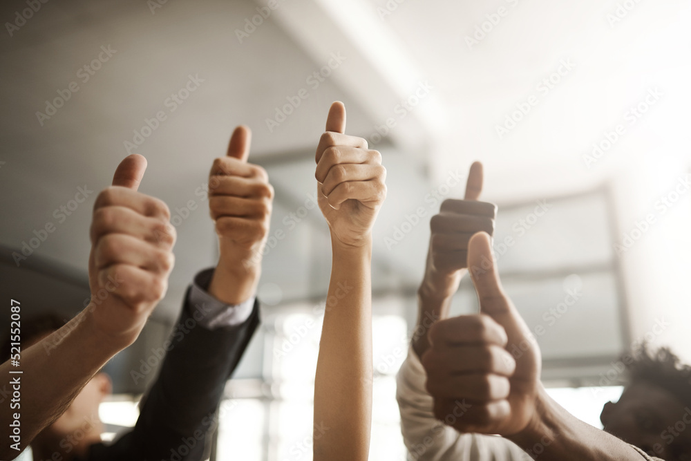 Thumbs up hand sign, symbol and gesture showing success, support or trust. Closeup fingers or thumbs