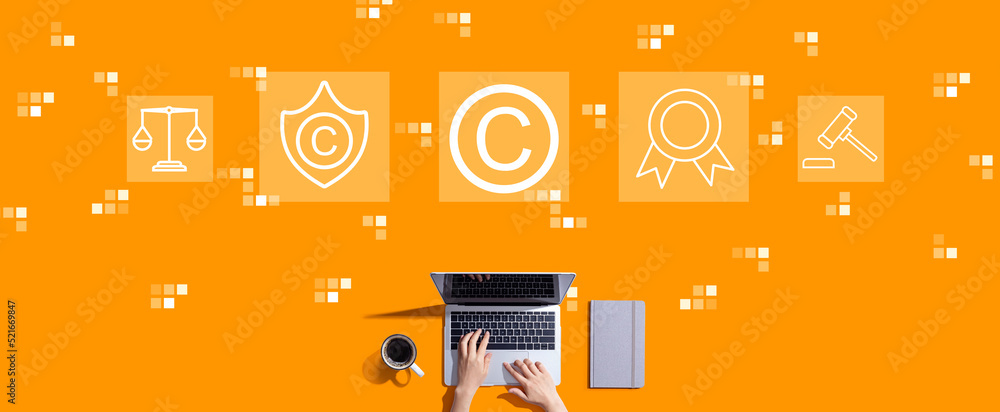 Copyright concept with person working with a laptop