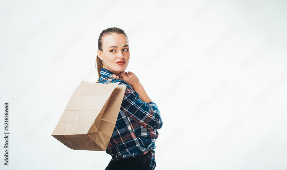 Attractive lifestyle girl manager. Young female model in worker shirt.