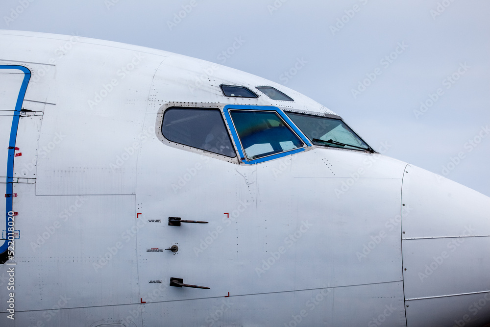 Aircraft front fuselage with cockpit on the runway of an airfield