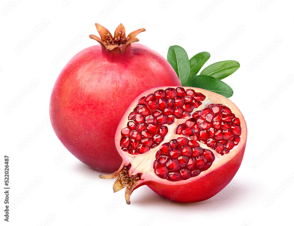 Fresh ripe pomegranate with cut in half isolated on white background. Clipping path.