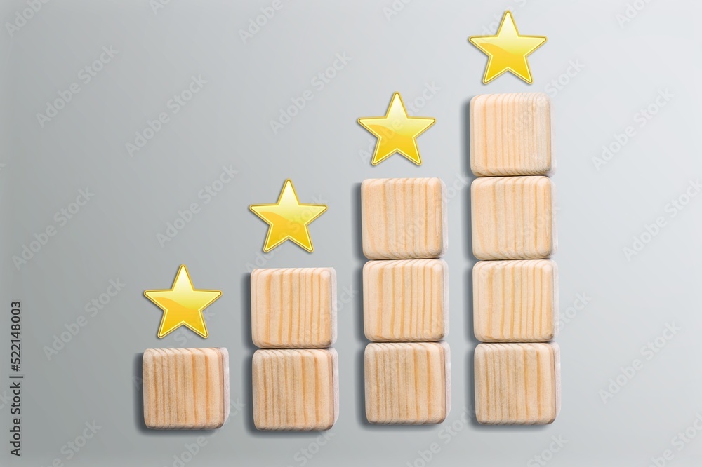 Wooden blocks with the five star symbol for Increase rating, Customer experience