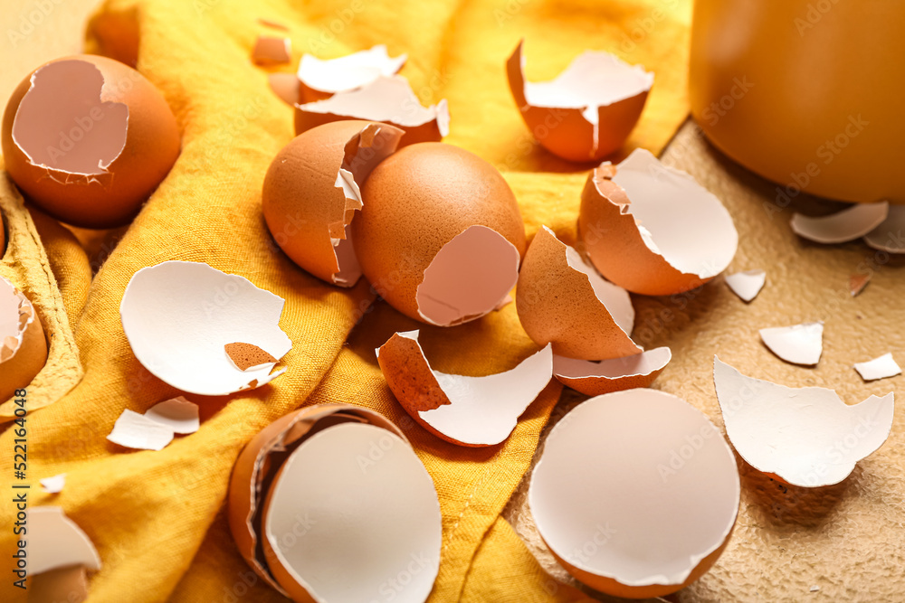 Scattered egg shells on table, closeup