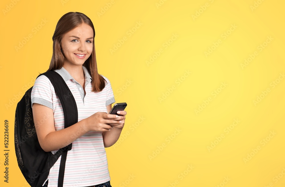 Young smiling happy girl woman teen student posing